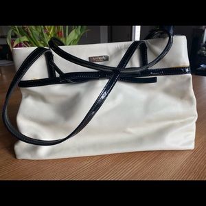 Black and white Kate Spade bag with bow detail